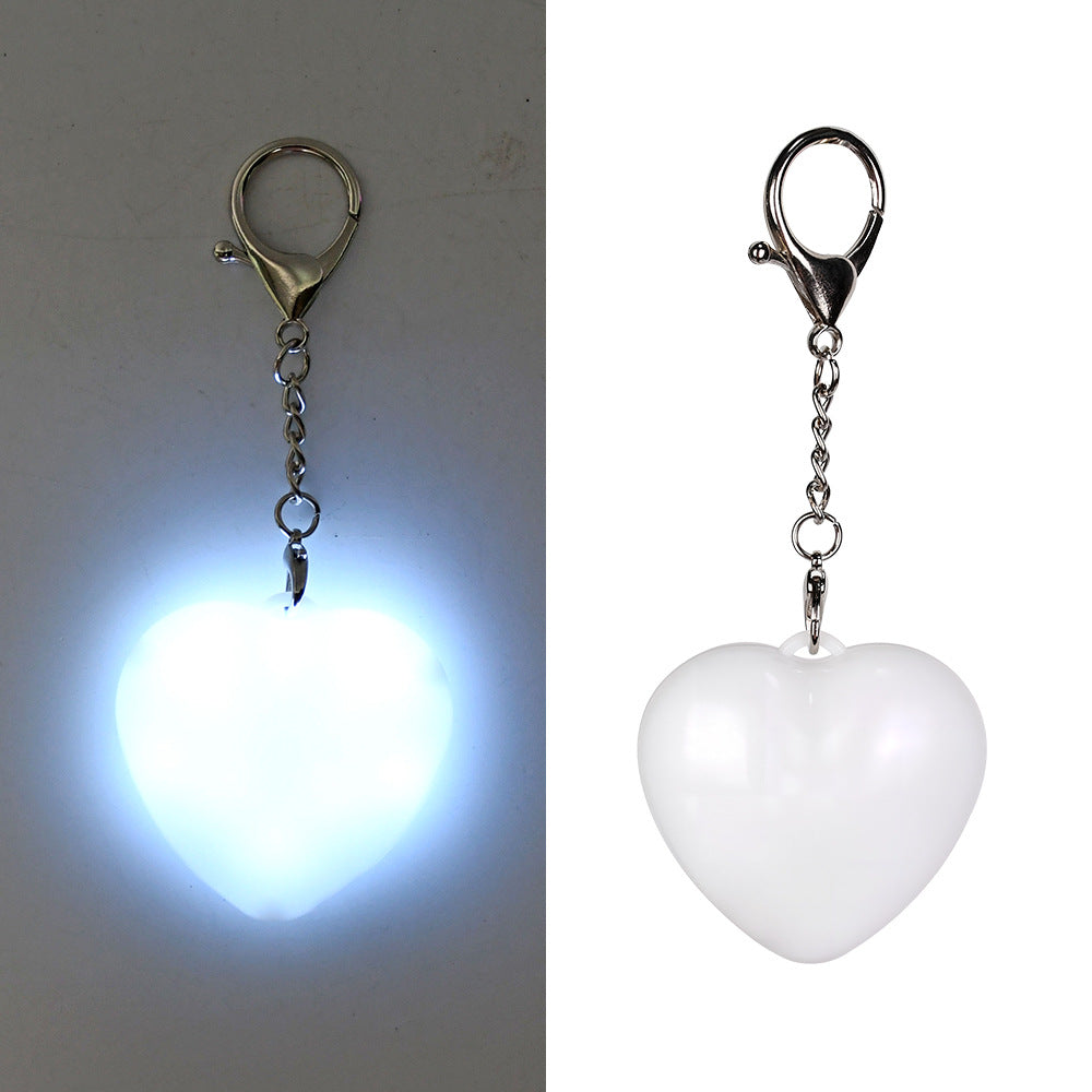 Flashlight keychain for a BAG
